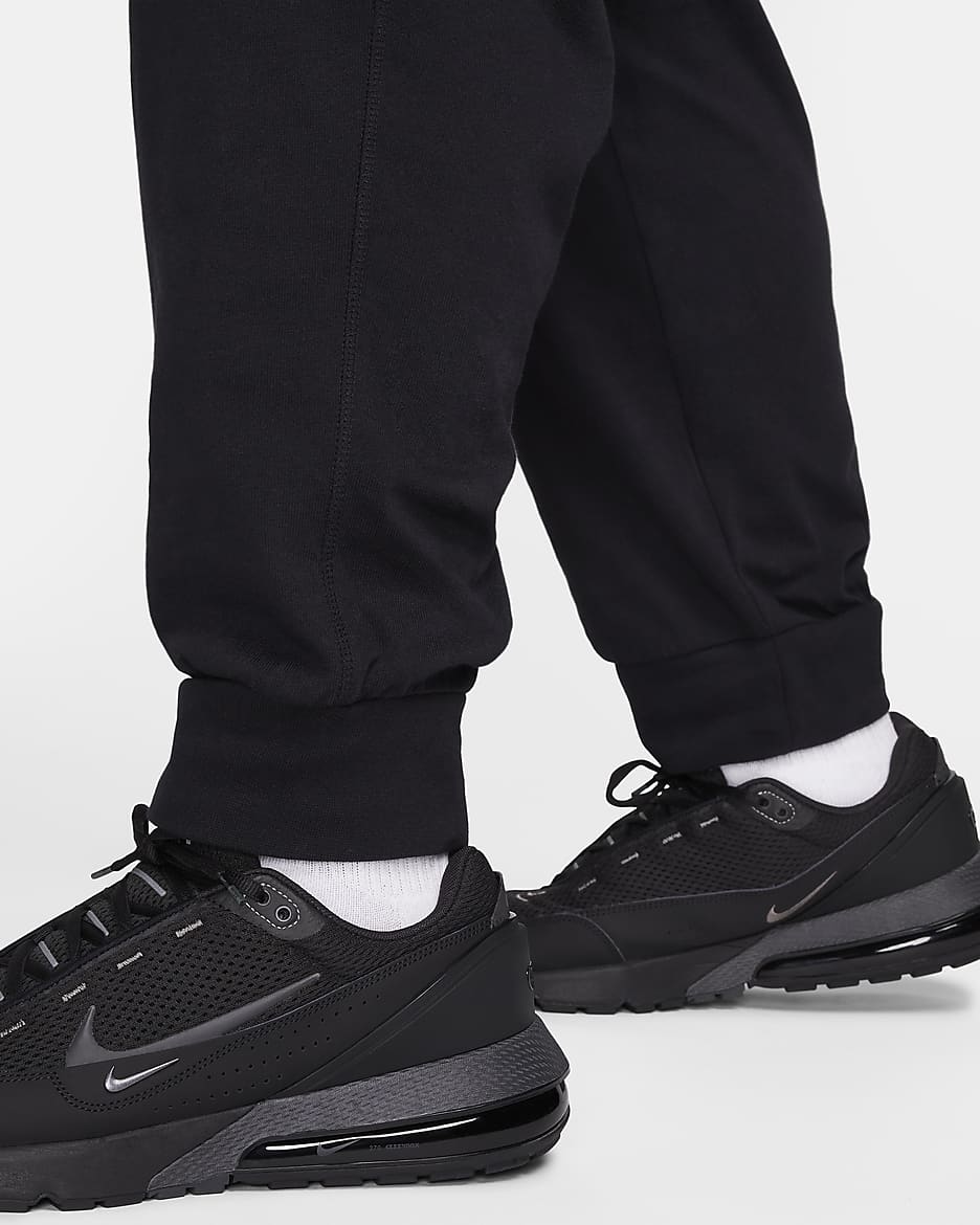 Nike running essential knit joggers in black best sale